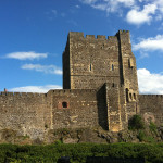 Carrickfergus castle against a blue sky