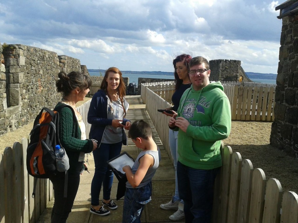 Young people user-testing the Siege! heritage app at Carrickfergus Castle